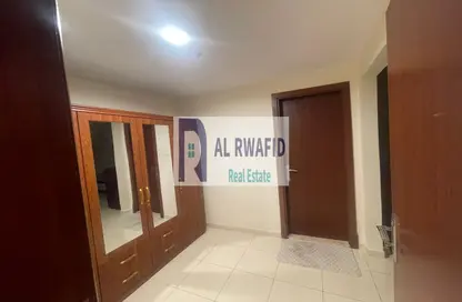 Apartment - 1 Bedroom - 2 Bathrooms for sale in Orient Towers - Al Bustan - Ajman