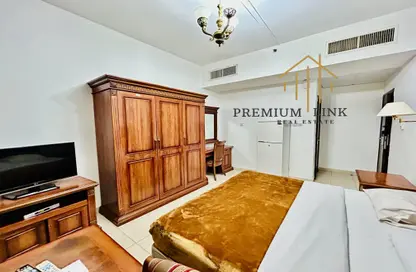 Apartment - Studio - 1 Bathroom for rent in Muraijeb Tower - Hamdan Street - Abu Dhabi