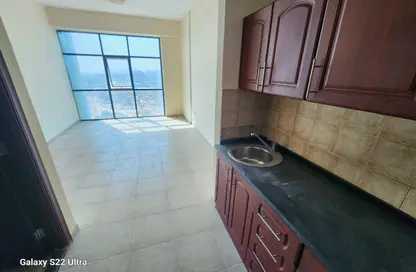 Apartment - Studio - 1 Bathroom for rent in Al Shaiba Building - Dubai Outsource Zone - Dubai