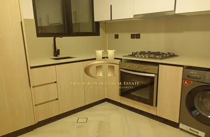 Apartment - 1 Bedroom - 2 Bathrooms for sale in Empire Residence - Jumeirah Village Circle - Dubai