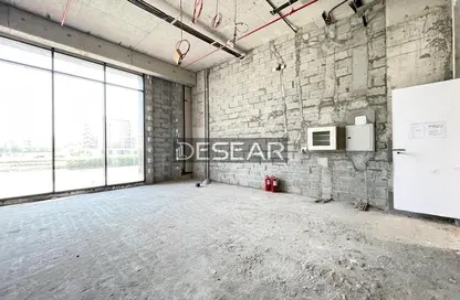 Retail - Studio - 2 Bathrooms for rent in Midtown Central Majan - Majan - Dubai