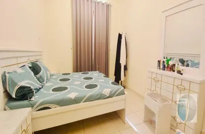 شقة - غرفة نوم - 2 حمامات للايجار في تي 02 - طراز أسباني - المدينة الدولية - دبي