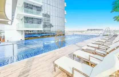 Pool image for: Apartment - 1 Bathroom for rent in Carson - DAMAC Hills - Dubai, Image 1