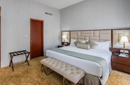 Room / Bedroom image for: Apartment - 2 Bedrooms - 2 Bathrooms for rent in Al Salam Tower - Dubai Media City - Dubai, Image 1