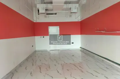 Shop - Studio - 1 Bathroom for rent in Al Shafar Park Tower - Al Karama - Dubai