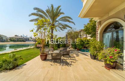 Villa - 4 Bedrooms - 6 Bathrooms for rent in Garden Homes Frond E - Garden Homes - Palm Jumeirah - Dubai