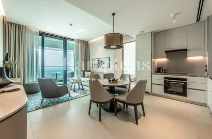 Living / Dining Room image for: Apartment - 1 Bedroom - 2 Bathrooms for rent in Jumeirah Gate Tower 2 - The Address Jumeirah Resort and Spa - Jumeirah Beach Residence - Dubai, Image 1