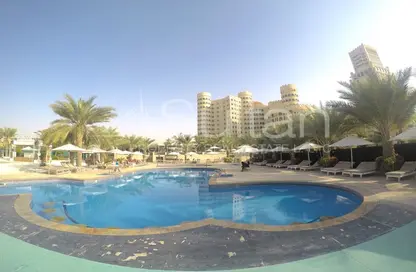 Pool image for: Hotel  and  Hotel Apartment - 1 Bathroom for sale in Al Hamra Palace Beach Resort - Al Hamra Village - Ras Al Khaimah, Image 1