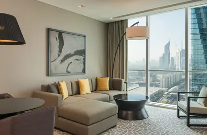 Living Room image for: Apartment - 1 Bedroom - 2 Bathrooms for rent in Sheraton Grand Hotel - Sheikh Zayed Road - Dubai, Image 1