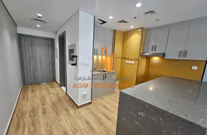 Kitchen image for: Apartment - 1 Bathroom for rent in The V Tower - Dubai Residence Complex - Dubai, Image 1