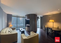 صورةغرفة المعيشة لـ: شقة - 1 غرفة نوم - 2 حمامات للكراء في مساكن أرماني - برج خليفة - دبي وسط المدينة - دبي, صورة 1
