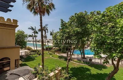 Villa - 4 Bedrooms - 5 Bathrooms for sale in Canal Cove Frond M - Canal Cove Villas - Palm Jumeirah - Dubai