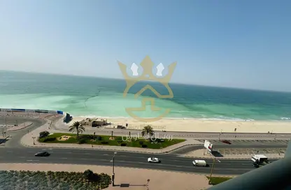 Apartment - 2 Bedrooms - 2 Bathrooms for sale in Corniche Tower - Ajman Corniche Road - Ajman