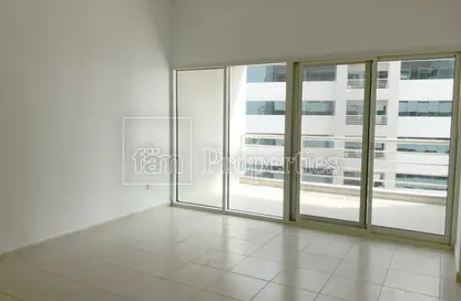 Empty Room image for: Apartment - 1 Bedroom - 2 Bathrooms for sale in Olympic Park 1 - Olympic Park Towers - Dubai Sports City - Dubai, Image 1