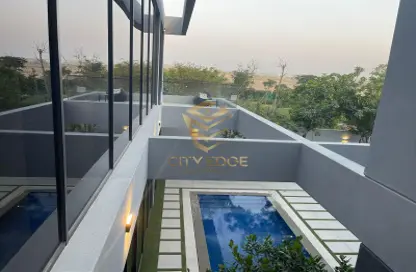 Villa - 4 Bedrooms - 6 Bathrooms for sale in Masaar Azalea - Masaar - Tilal City - Sharjah