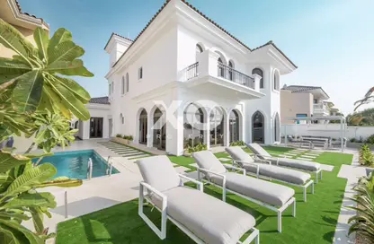 Villa - 5 Bedrooms - 6 Bathrooms for rent in Garden Homes Frond E - Garden Homes - Palm Jumeirah - Dubai