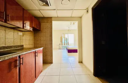 Apartment - 1 Bathroom for rent in IC1-EMR-11 - Emirates Cluster - International City - Dubai