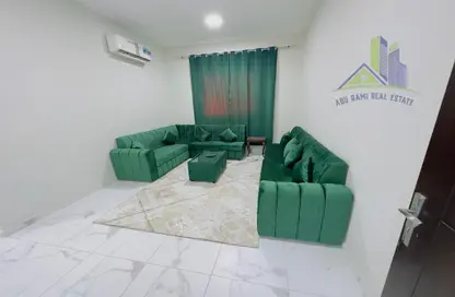 صورة لـ غرفة المعيشة شقة - غرفة نوم - 2 حمامات للايجار في 2 المويهات - المويهات - عجمان ، صورة رقم 1