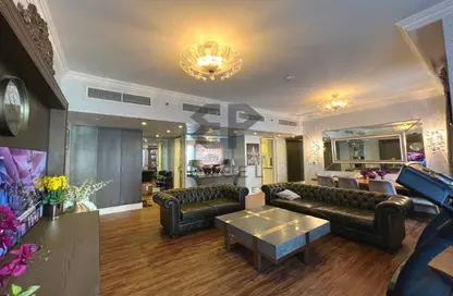 Living Room image for: Apartment - 3 Bedrooms - 4 Bathrooms for rent in Shams 4 - Shams - Jumeirah Beach Residence - Dubai, Image 1