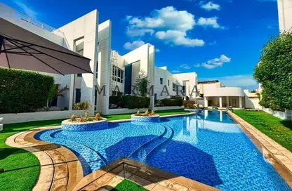 Villa - 4 Bedrooms - 5 Bathrooms for rent in Jumeirah 1 Villas - Jumeirah 1 - Jumeirah - Dubai