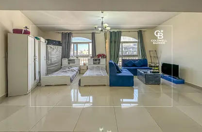 Living Room image for: Apartment - 1 Bathroom for sale in Diamond Views 3 - Diamond Views - Jumeirah Village Circle - Dubai, Image 1