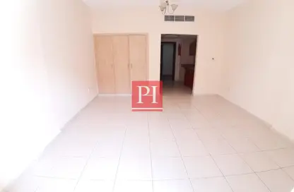 Apartment - 1 Bathroom for rent in IC1-EMR-08 - Emirates Cluster - International City - Dubai