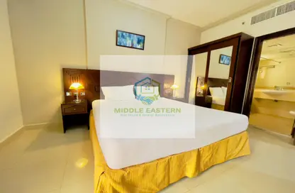 Room / Bedroom image for: Apartment - 1 Bedroom - 1 Bathroom for rent in Al Wahda Street - Al Wahda - Abu Dhabi, Image 1