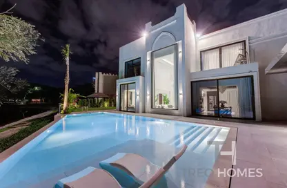 Villa - 5 Bedrooms - 6 Bathrooms for rent in Entertainment Foyer - European Clusters - Jumeirah Islands - Dubai