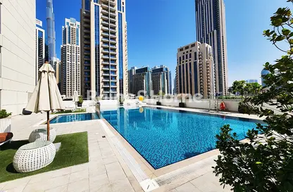 Apartment - 1 Bedroom - 2 Bathrooms for rent in Bahwan Tower Downtown - Downtown Dubai - Dubai