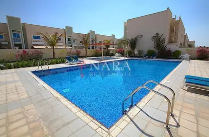 Villa - 4 Bedrooms - 5 Bathrooms for rent in Liwa Oasis compound - Khalifa City - Abu Dhabi