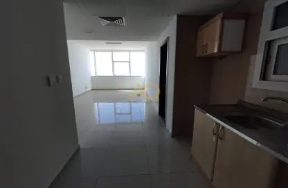 Apartment - 1 Bathroom for rent in Tiger Building Al Qadesia - Al Nahda - Sharjah