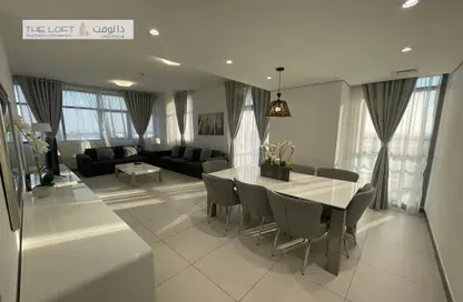 Living / Dining Room image for: Apartment - 3 Bedrooms - 3 Bathrooms for rent in AD One Tower - Capital Centre - Abu Dhabi, Image 1