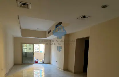 Apartment - 2 Bedrooms - 2 Bathrooms for sale in Lilies Tower - Emirates City - Ajman