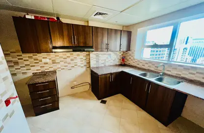 Apartment - 1 Bedroom - 2 Bathrooms for rent in Zig Zag Building - Tourist Club Area - Abu Dhabi