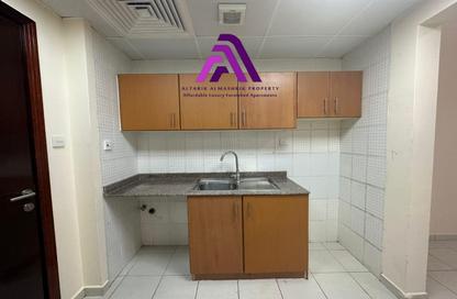 Apartment - 1 Bathroom for rent in France Cluster - International City - Dubai