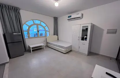 Room / Bedroom image for: Apartment - 1 Bathroom for rent in Al Nahyan Camp - Abu Dhabi, Image 1