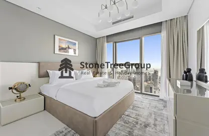 Room / Bedroom image for: Apartment - 2 Bedrooms - 2 Bathrooms for rent in Paramount Tower Hotel  and  Residences - Business Bay - Dubai, Image 1