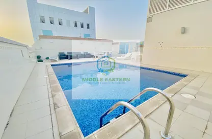 صورة لـ حوض سباحة شقة - غرفة نوم - 2 حمامات للايجار في 1 برج المقطعة - هضبة الزعفرانة - منطقة المرور - أبوظبي ، صورة رقم 1