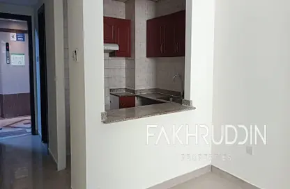 Apartment - 1 Bathroom for rent in Trafalgar Tower - CBD (Central Business District) - International City - Dubai