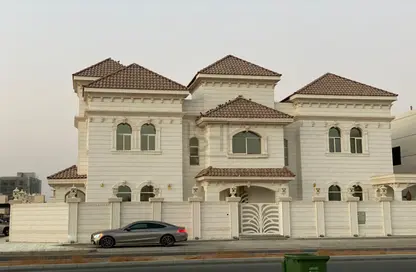 Villa - 5 Bedrooms - 7 Bathrooms for sale in Ajman Hills - Al Alia - Ajman