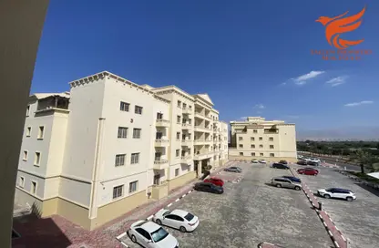 Outdoor Building image for: Apartment - 1 Bedroom - 2 Bathrooms for rent in Yasmin Tower - Yasmin Village - Ras Al Khaimah, Image 1