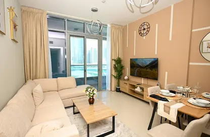 Living / Dining Room image for: Apartment - 1 Bedroom - 2 Bathrooms for rent in Julphar Residence - Al Reem Island - Abu Dhabi, Image 1