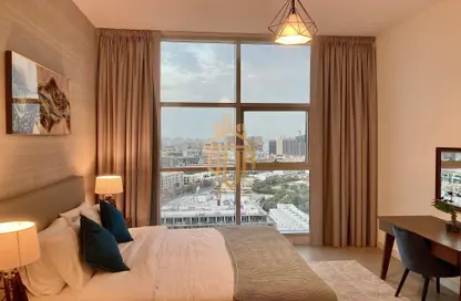 Room / Bedroom image for: Apartment - 1 Bedroom - 2 Bathrooms for rent in La Riviera Apartments - Jumeirah Village Circle - Dubai, Image 1