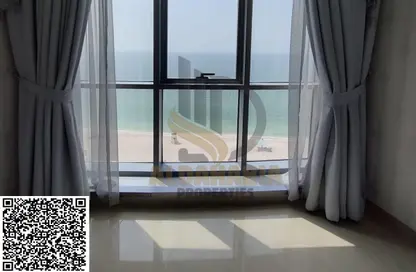 Apartment - 2 Bedrooms - 3 Bathrooms for sale in Corniche Tower - Ajman Corniche Road - Ajman