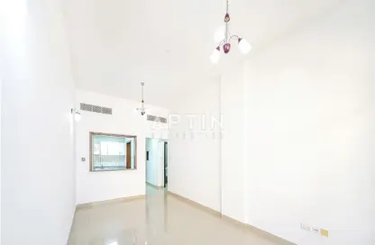 Empty Room image for: Apartment - 1 Bedroom - 2 Bathrooms for rent in Silicon Avenue - Dubai Silicon Oasis - Dubai, Image 1