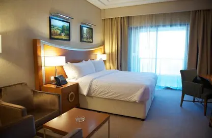 صورة لـ غرفة- غرفة النوم النزل و الشقق الفندقية - 1 حمام للايجار في فندق جراند بلفيو - برشا هايتس (تيكوم) - دبي ، صورة رقم 1