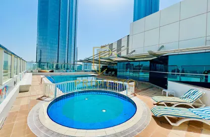 Apartment - 3 Bedrooms - 4 Bathrooms for rent in Golden Falcon Tower - Hamdan Street - Abu Dhabi