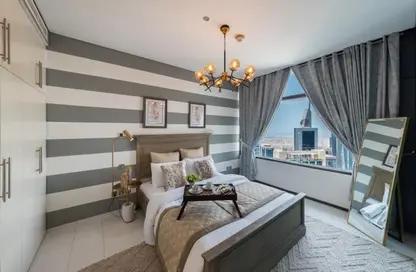 Room / Bedroom image for: Apartment - 1 Bedroom - 2 Bathrooms for rent in Index Tower - DIFC - Dubai, Image 1