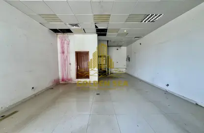 Shop - Studio - 1 Bathroom for rent in Al Taghreed Tower - Airport Road - Abu Dhabi