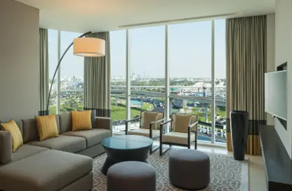 Living Room image for: Apartment - 3 Bedrooms - 5 Bathrooms for rent in Sheraton Grand Hotel - Sheikh Zayed Road - Dubai, Image 1